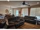 Inviting living room with plenty of natural light and comfortable furnishings at 27158 W Potter Dr, Buckeye, AZ 85396