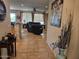Open-concept living room featuring tile floors, comfortable seating, and ample natural light at 27158 W Potter Dr, Buckeye, AZ 85396