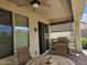 Inviting covered patio area with outdoor furniture, ceiling fan, and built-in grill perfect for entertaining at 27158 W Potter Dr, Buckeye, AZ 85396