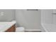 Clean bathroom featuring a white toilet and bathtub with tile surround for a functional and classic design at 3076 E Dunbar Dr, Phoenix, AZ 85042