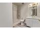 Bathroom featuring a tub with shower, vanity, and simple but functional fixtures at 3248 E Windrose Dr, Phoenix, AZ 85032