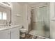 Bathroom featuring a glass-enclosed shower, vanity, and coordinated fixtures at 3248 E Windrose Dr, Phoenix, AZ 85032