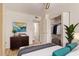 Relaxing bedroom features modern accents, closet, and wood-look flooring at 3248 E Windrose Dr, Phoenix, AZ 85032