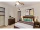 Cozy bedroom featuring comfortable bedding, modern furniture, and soft lighting at 3248 E Windrose Dr, Phoenix, AZ 85032
