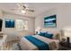 Bedroom featuring natural light, a ceiling fan, and modern decorations at 3248 E Windrose Dr, Phoenix, AZ 85032