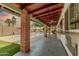 Covered patio overlooking a refreshing pool and desert landscaping at 3248 E Windrose Dr, Phoenix, AZ 85032