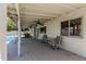 Relaxing covered patio featuring seating area, and outdoor dining space perfect for entertaining near the pool at 3300 N Coronado St, Chandler, AZ 85224