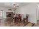 Cozy dining room featuring a brick fireplace, wood table, and stylish decor elements at 3300 N Coronado St, Chandler, AZ 85224