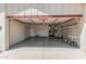 Well-lit two car garage with an overhead door and convenient built in storage features at 3300 N Coronado St, Chandler, AZ 85224