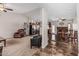 Open-concept living room and kitchen layout, featuring neutral tones and comfortable seating arrangements at 3300 N Coronado St, Chandler, AZ 85224