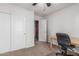 Office space with neutral colored walls and ceiling fan at 3300 N Coronado St, Chandler, AZ 85224