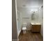 Bathroom featuring a single sink vanity and a walk-in shower at 3434 W Augusta Ave, Phoenix, AZ 85051
