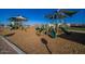 Community playground with slides, climbing structures, swings, and safe recreational amenities at 4050 E Brittlebush Ln, San Tan Valley, AZ 85140