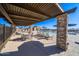 Resort-style community pool with covered seating areas and multiple lounge chairs for relaxation at 4050 E Brittlebush Ln, San Tan Valley, AZ 85140