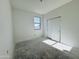 Light-filled bedroom featuring a window and a closet with sliding doors at 47333 W Coe St, Maricopa, AZ 85139