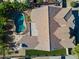 Aerial view of the property, showcasing the pool, landscaping, and roof at 4809 E Red Range Way, Cave Creek, AZ 85331