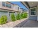 This backyard features pavers, a privacy fence, and small plants at 4833 S Ferric --, Mesa, AZ 85212