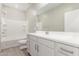 Bathroom with a tub and shower combo, a vanity, and a white ceramic tile flooring at 4833 S Ferric --, Mesa, AZ 85212