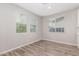 This bedroom has a hard surface floor and large window that provides natural light at 4833 S Ferric --, Mesa, AZ 85212
