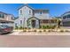 Charming two-story home featuring a combination of gray and brown siding with manicured landscaping at 4833 S Ferric --, Mesa, AZ 85212