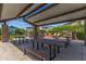 An outdoor pavilion featuring picnic tables, a built-in grill, and comfortable seating options for residents' enjoyment at 4833 S Ferric --, Mesa, AZ 85212