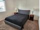 Bright bedroom with a queen bed, side tables, and a calm ambiance for relaxation at 520 S Evergreen Rd, Tempe, AZ 85288