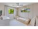 Inviting bedroom with neutral colors, soft natural lighting, plush chair, and whimsical play tent at 5425 E Avalon Dr, Phoenix, AZ 85018