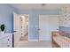 Bright bedroom with baby blue walls, sliding door closet, and charming animal-themed wallpaper at 5425 E Avalon Dr, Phoenix, AZ 85018