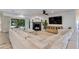 Comfortable living room with a fireplace, large sectional, and backyard view at 5425 E Avalon Dr, Phoenix, AZ 85018