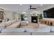 Spacious living room showcasing a fireplace and a large sectional sofa at 5425 E Avalon Dr, Phoenix, AZ 85018