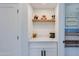 Charming nook features a quartz counter and fun animal decor, adjacent to a stylish blue bedroom at 5425 E Avalon Dr, Phoenix, AZ 85018
