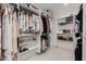 Spacious walk-in closet with custom shelving and ample storage space for clothing, shoes, and accessories at 5425 E Avalon Dr, Phoenix, AZ 85018