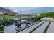 Scenic backyard featuring a modern fire pit seating area with mountain and golf course views for relaxing outdoor living at 6142 E Alta Hacienda Dr, Scottsdale, AZ 85251