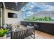 This is a relaxing balcony area offering stunning views of the mountain, golf course, and city skyline at 6142 E Alta Hacienda Dr, Scottsdale, AZ 85251