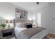 This is a bright bedroom featuring contemporary decor, including a stylish bed and matching nightstands at 6142 E Alta Hacienda Dr, Scottsdale, AZ 85251