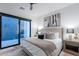 This is a stylish bedroom with a sliding glass door, letting in ample light and providing outdoor access at 6142 E Alta Hacienda Dr, Scottsdale, AZ 85251