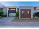 Contemporary home featuring modern architecture and desert landscaping, creating an inviting and stylish exterior at 6142 E Alta Hacienda Dr, Scottsdale, AZ 85251