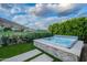 Backyard hot tub with beautiful mountain view offers a relaxing and luxurious outdoor spa experience at 6142 E Alta Hacienda Dr, Scottsdale, AZ 85251