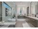 Sleek bathroom features a modern tub, floating cabinets, and stylish mirrors at 6142 E Alta Hacienda Dr, Scottsdale, AZ 85251
