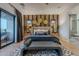 Beautiful bedroom boasts an accent wall, stylish furnishings, and modern lighting at 6142 E Alta Hacienda Dr, Scottsdale, AZ 85251