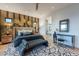 Luxurious bedroom boasts an accent wall, stylish furnishings, and modern lighting at 6142 E Alta Hacienda Dr, Scottsdale, AZ 85251