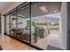 Inviting covered patio with comfortable seating, scenic views, and seamless transition from indoor living space at 6142 E Alta Hacienda Dr, Scottsdale, AZ 85251