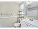 Bright bathroom with white vanity, a large mirror, and a shower-tub combination with a window at 633 S 96Th St, Mesa, AZ 85208