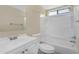 Bathroom with single sink vanity, white toilet and shower and tub combination at 633 S 96Th St, Mesa, AZ 85208