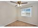 Neutral bedroom featuring carpet, a ceiling fan, and a window with natural light at 633 S 96Th St, Mesa, AZ 85208