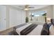 Cozy bedroom featuring a large window, comfortable bed, and ample closet space at 633 S 96Th St, Mesa, AZ 85208