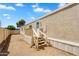 Charming single-story home with a white-trimmed entry, set against a bright blue sky and a desert landscape at 633 S 96Th St, Mesa, AZ 85208