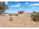 A charming single story home with a desert landscaped front yard and visible mailbox at 633 S 96Th St, Mesa, AZ 85208