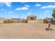A charming single story home with a desert landscaped front yard and visible mailbox at 633 S 96Th St, Mesa, AZ 85208