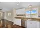 Bright kitchen features granite countertops, stainless steel appliances, and ample cabinet space at 633 S 96Th St, Mesa, AZ 85208